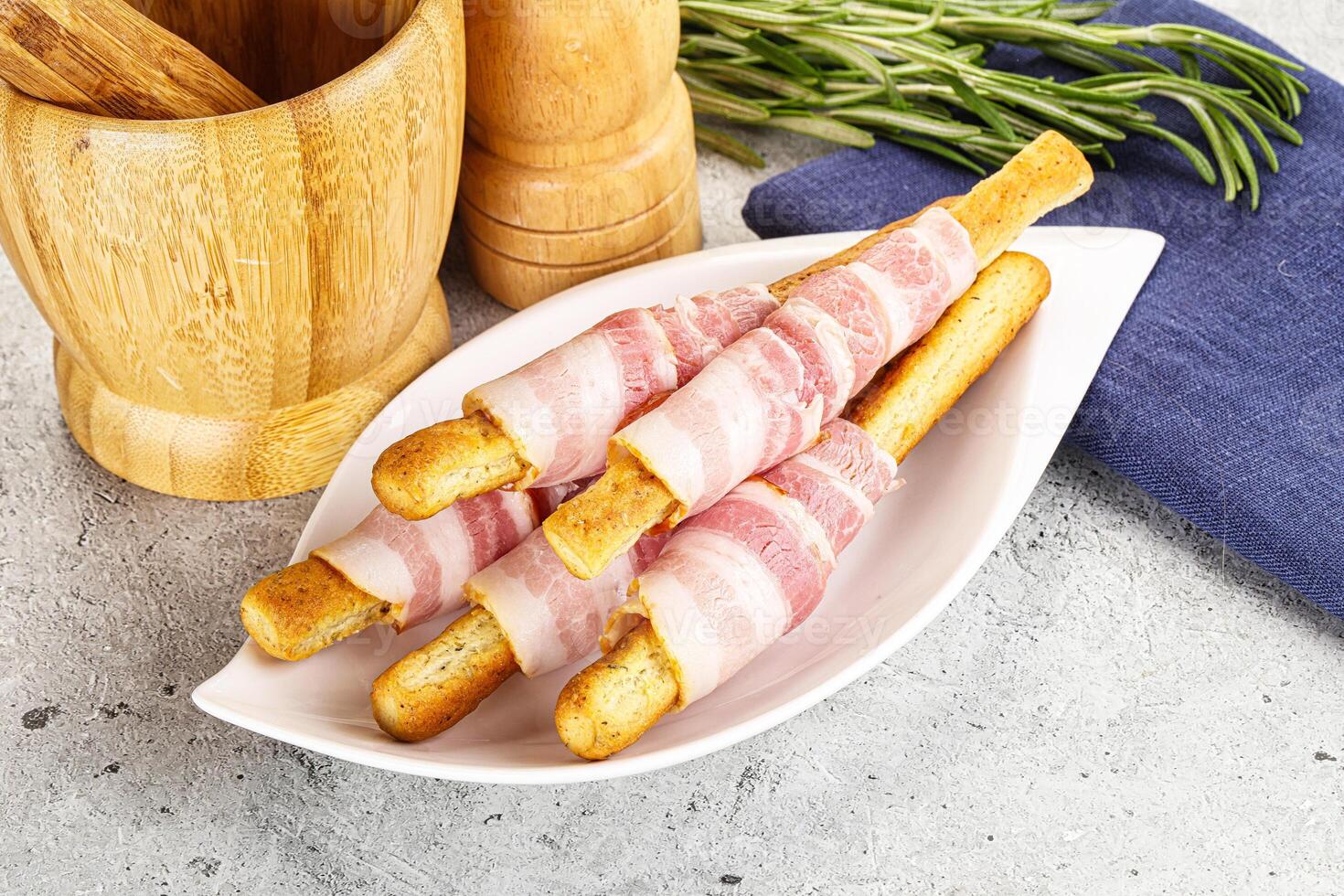 Crispy grissini italian bread with bacon photo