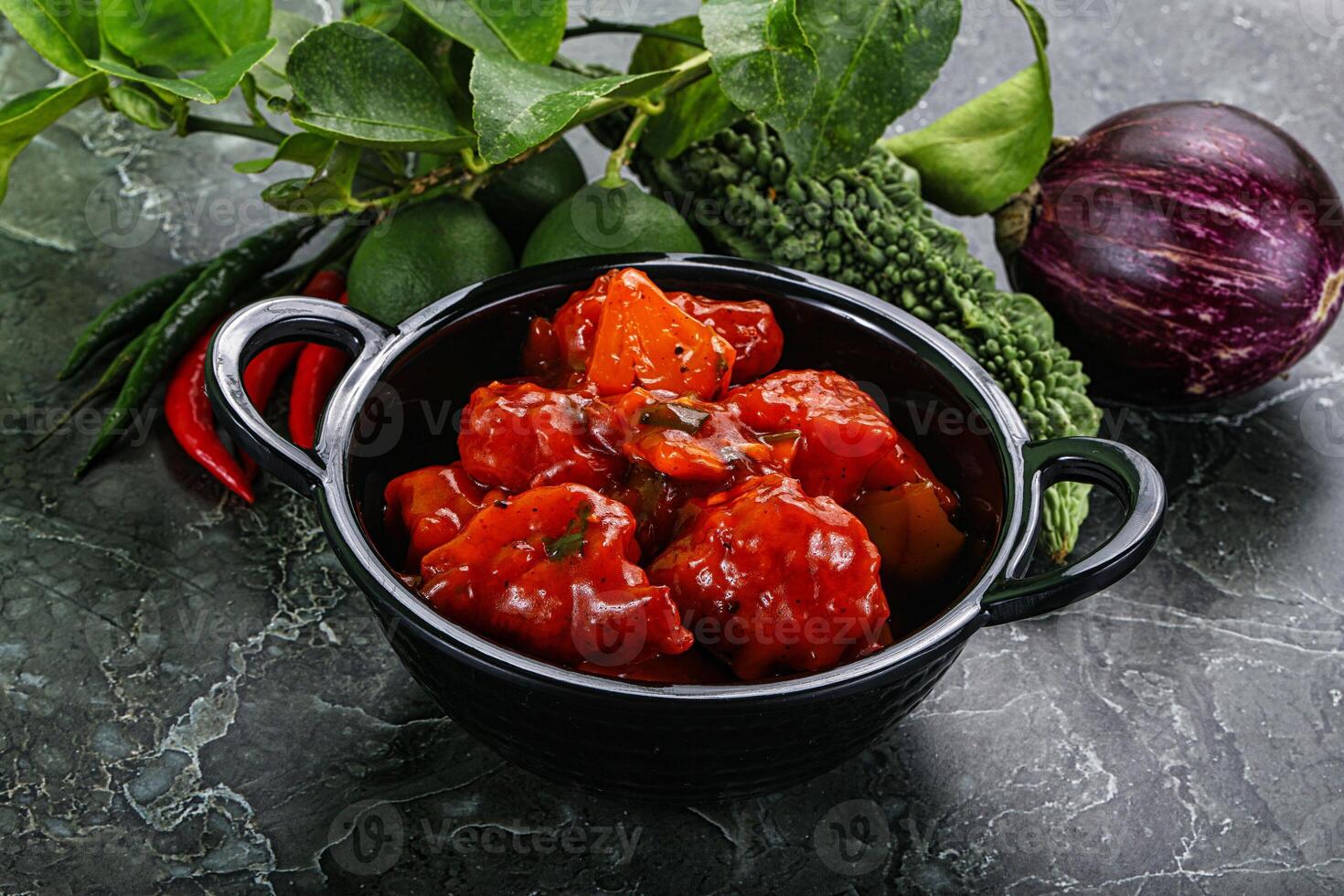 Chinese cuisine - chicken in sweet and sour sauce photo