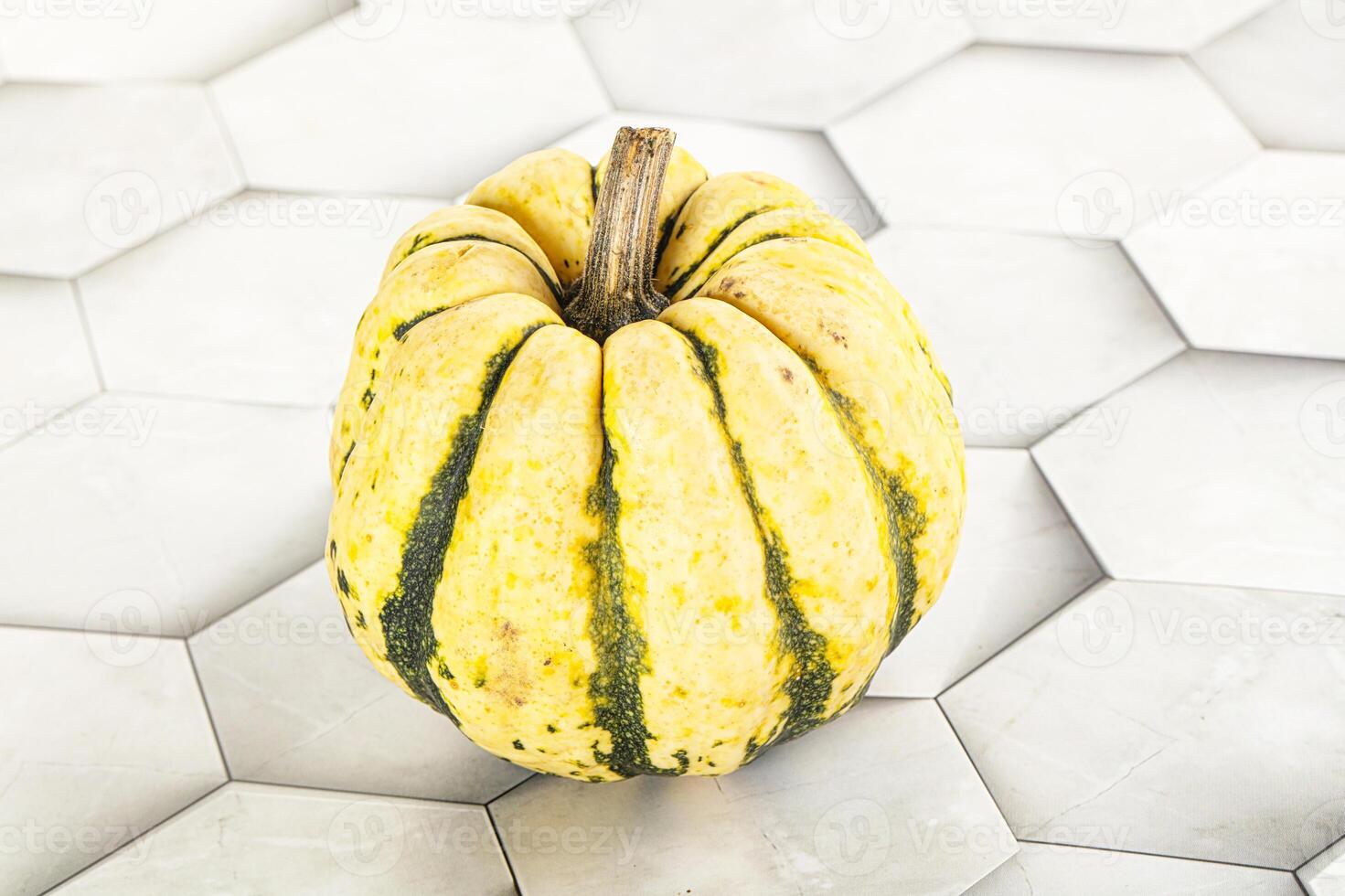 Ripe raw fresh decorative pumpkin photo