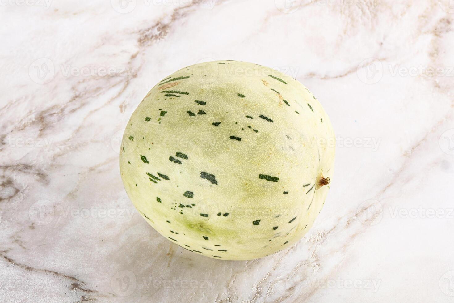 Ripe sweet juicy Dalmatin melon photo