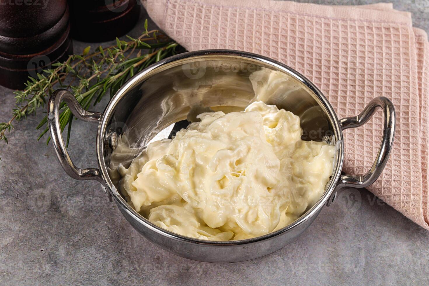 Italian soft young cheese stracciatella photo