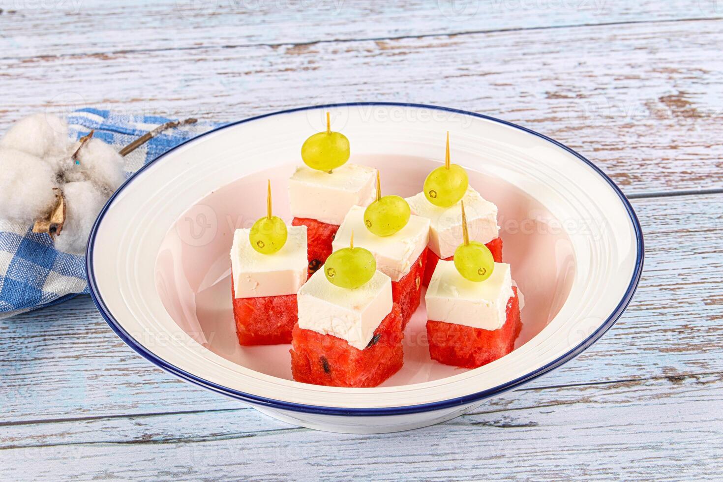 Watermelon with feta and grape photo