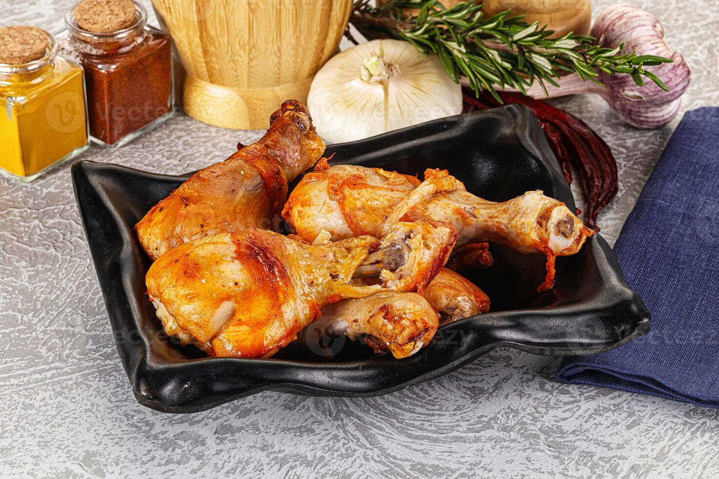 Raw marinated chicken drumstick for cooking photo