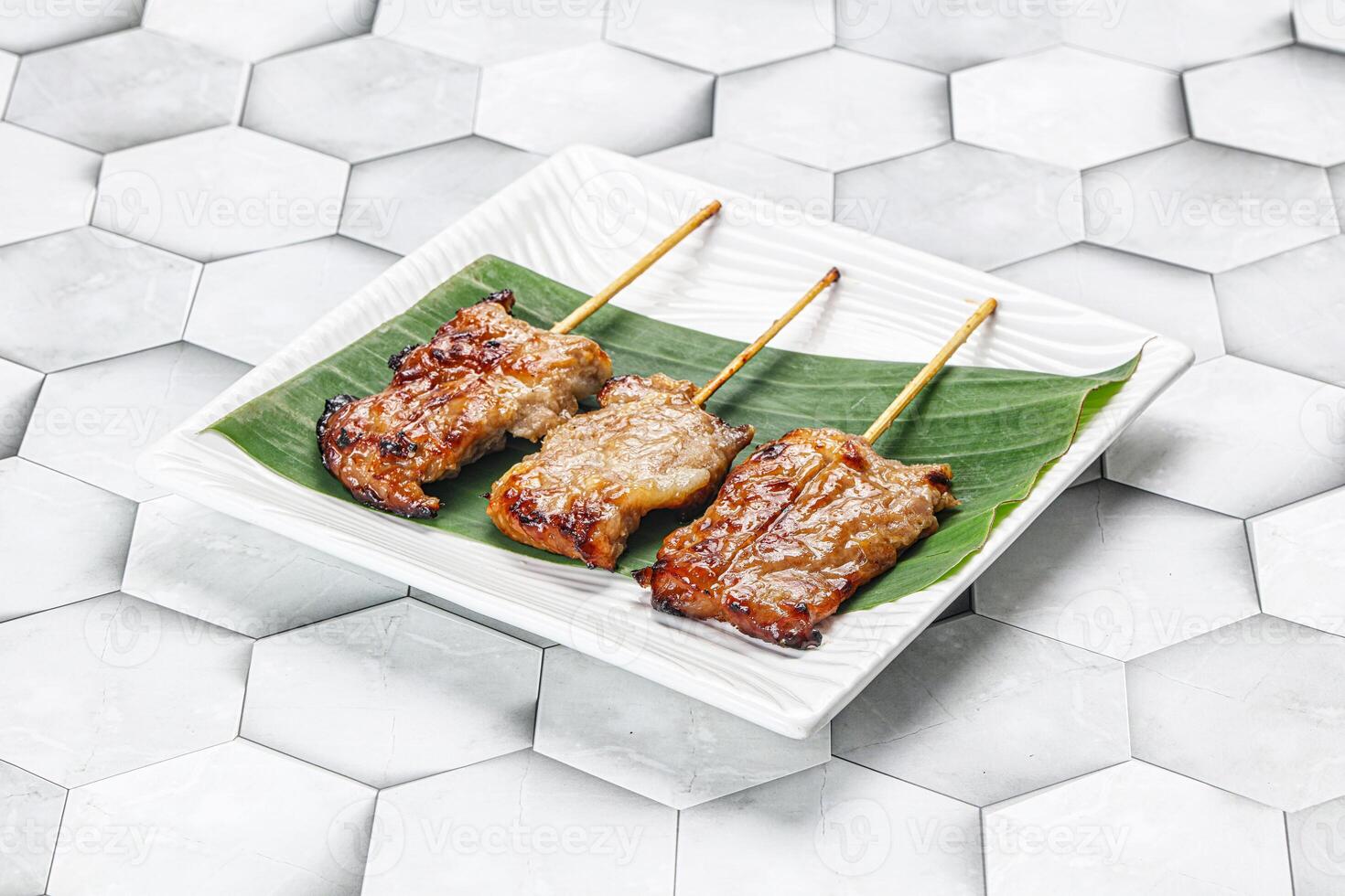 Thai cuisine - grilled pork skewer photo