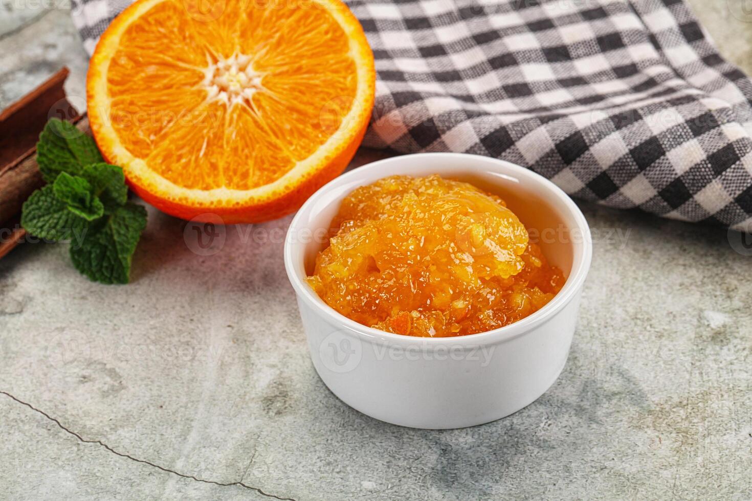 Tasty homemade Orange jam in the bowl photo