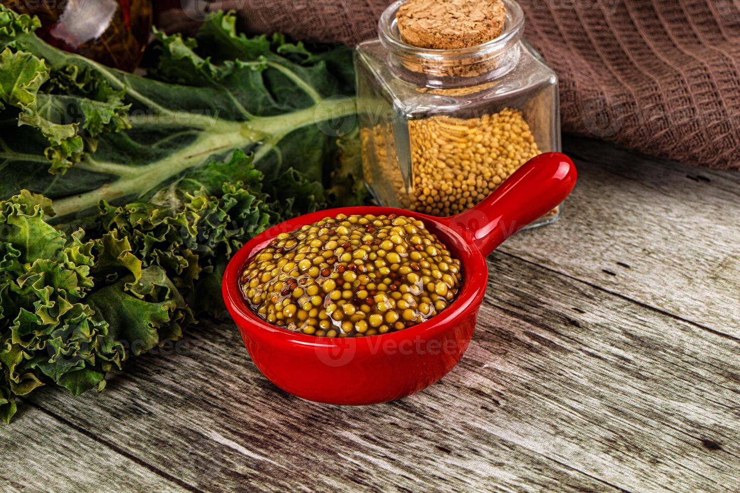 Mustard sauce with seeds in the bowl photo