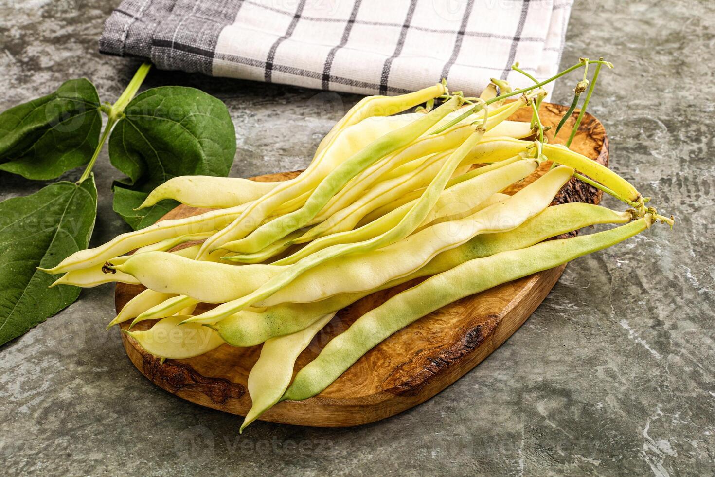 Raw green bean strings heap photo