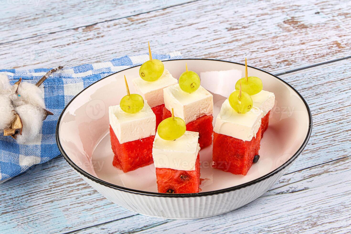 Watermelon with feta and grape photo