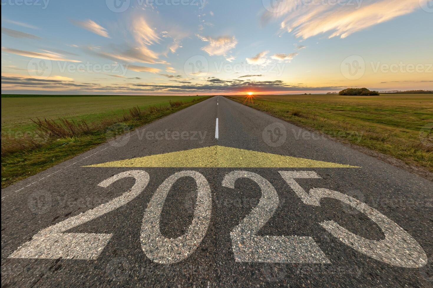 numbers 2025 and start on asphalt road highway with cracks with sunrise or sunset sky background. concept of destination in future, freedom, work start, run, planning, challenge, target, new year photo