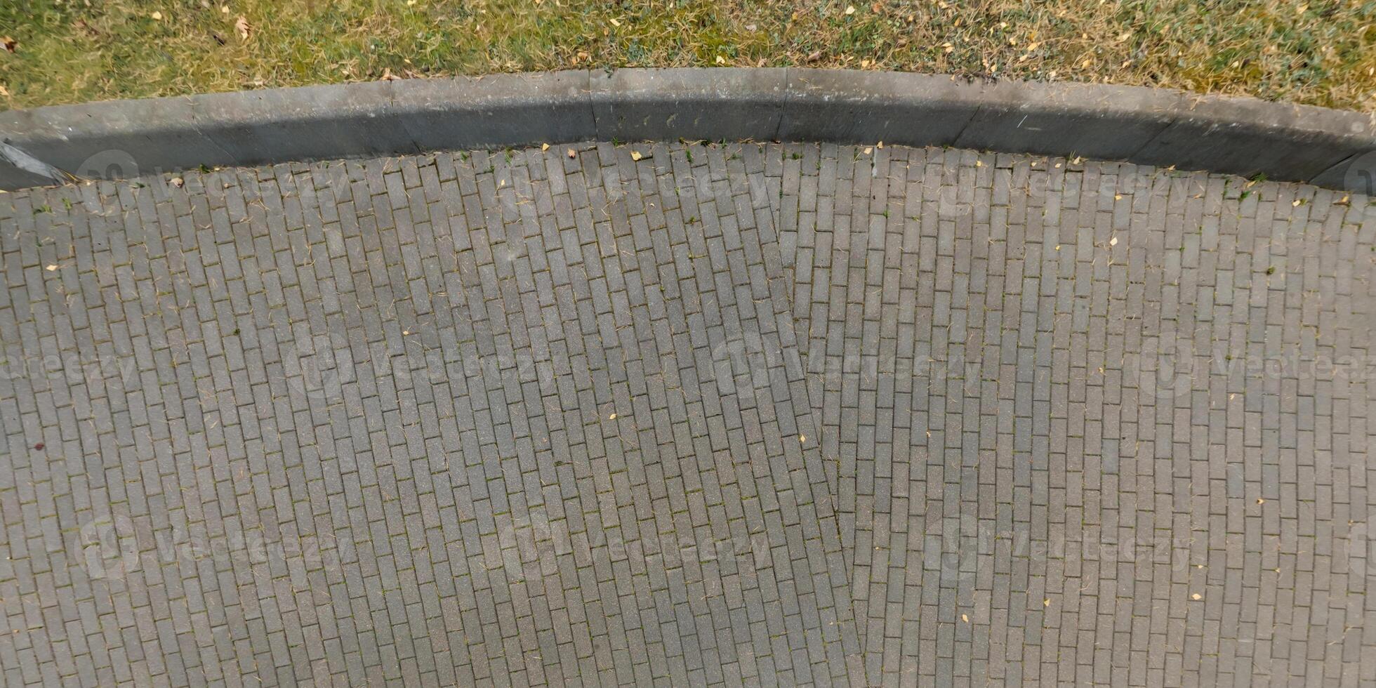 top view of surface of pedestrian path with paving slabs photo