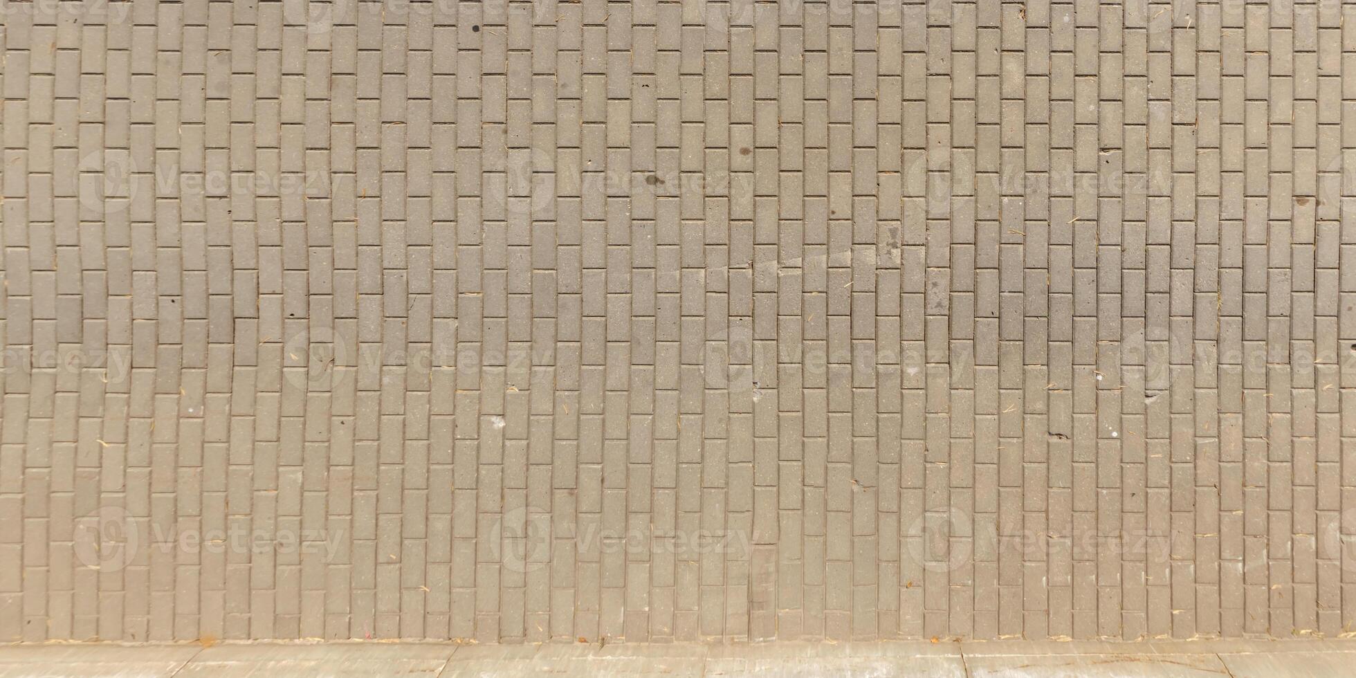 top view of surface of pedestrian path with paving slabs photo