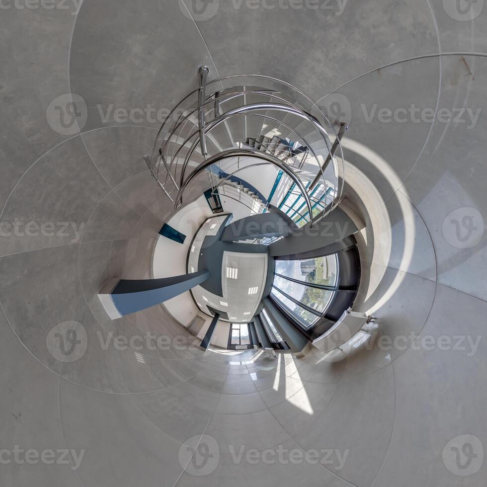 abstractly twisted into spherical 360 panorama interior of modern office with hall staircase and panoramic windows photo