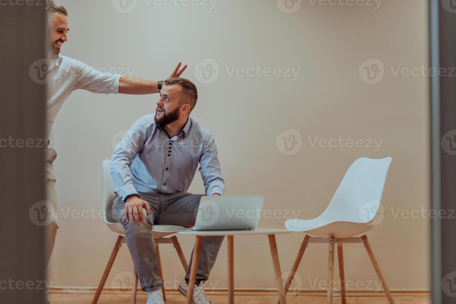 Programmers have fun on a break from work while working together to solve various programming codes photo