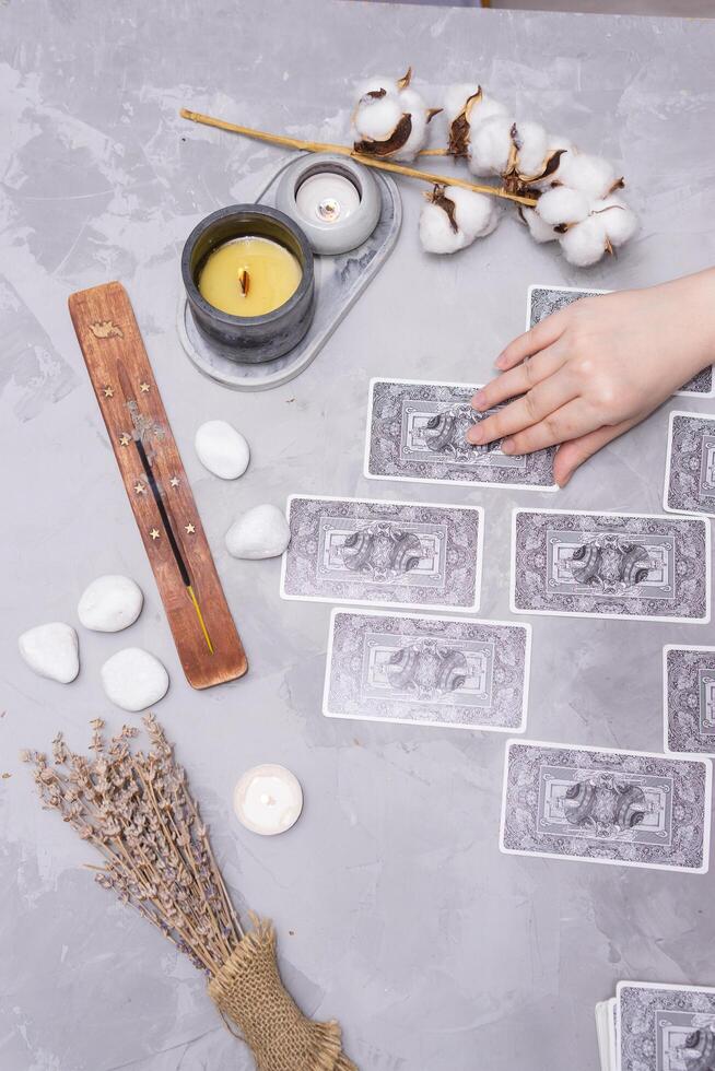 TVER, RUSSIA - FEBRUARY 18, 2024. Tarot cards, Tarot card divination, fortune telling. Occultism, esoteric education. photo