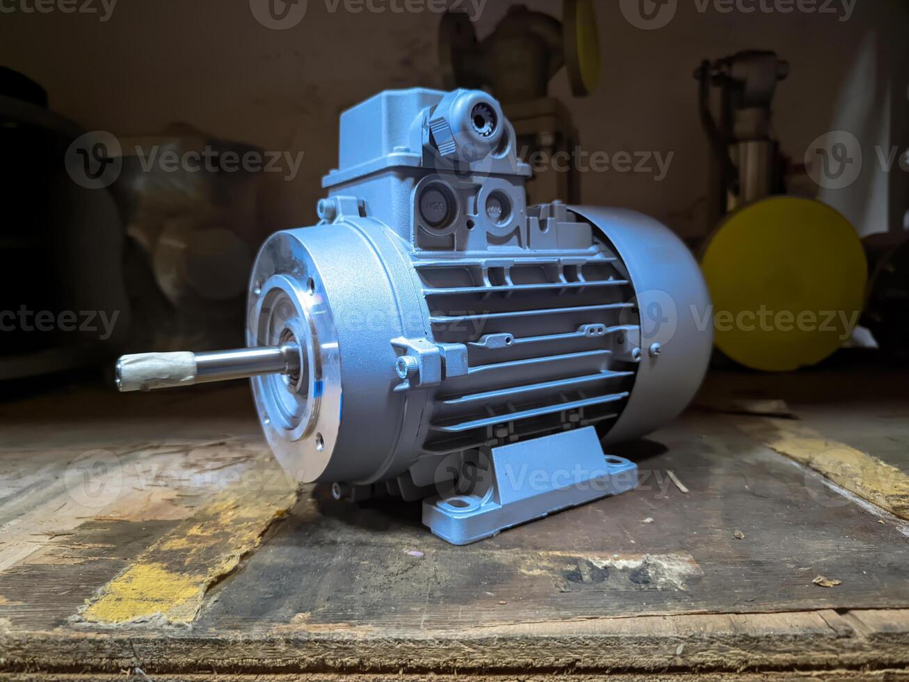 Industrial Electric Motor on a Wooden Surface photo
