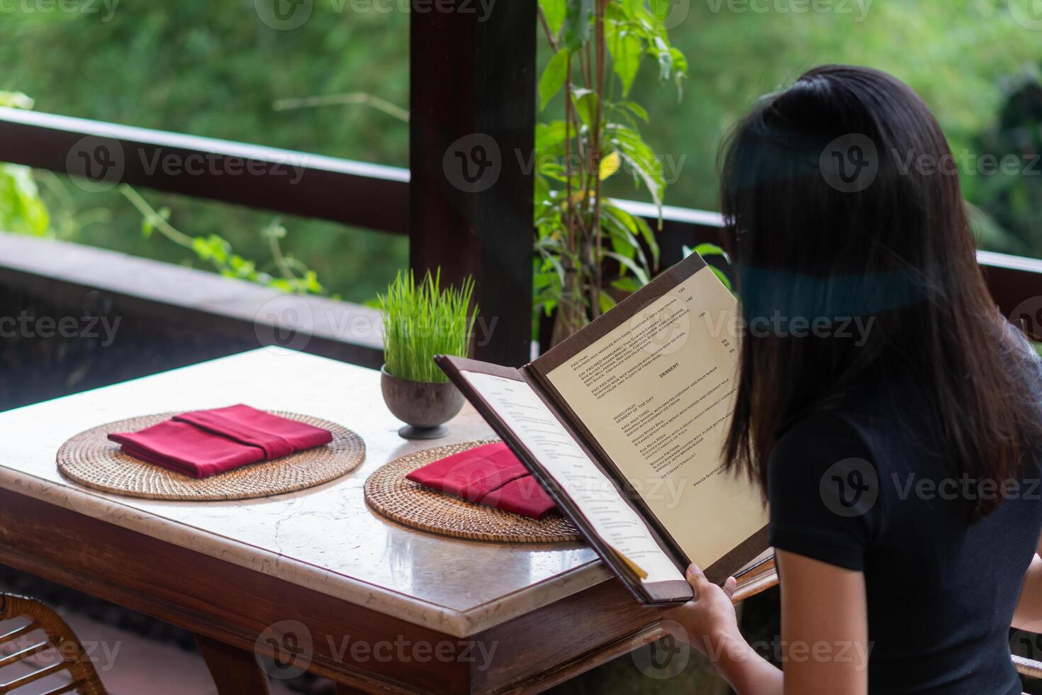 Elegant Dining Table Setting with Red Napkins photo