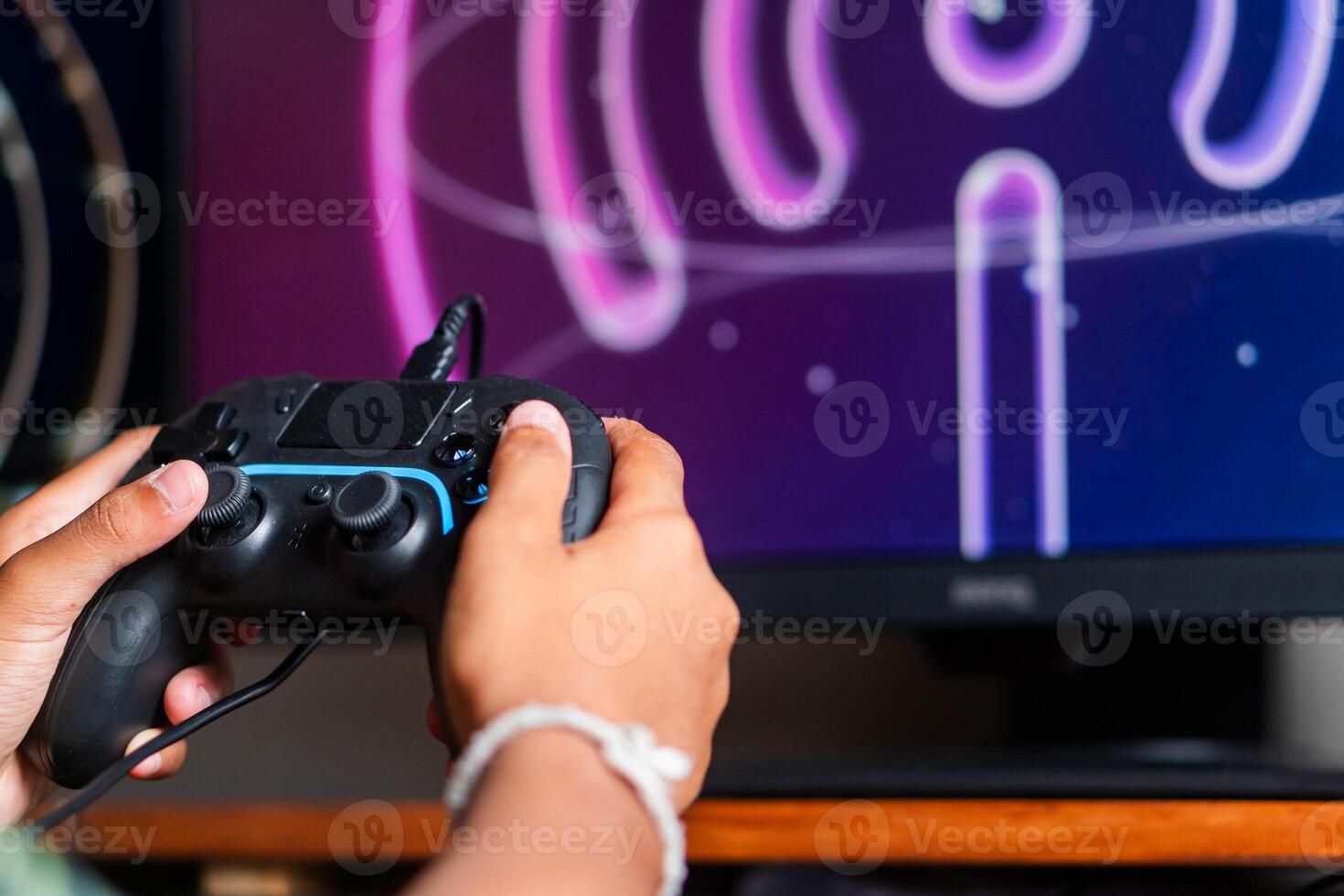 Gaming with Wireless Controller and Neon Wu-F Symbol photo