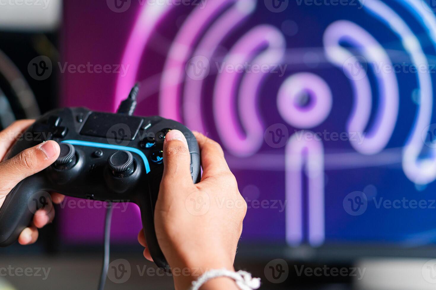 Gaming with Wireless Controller and Neon Wu-F Symbol photo