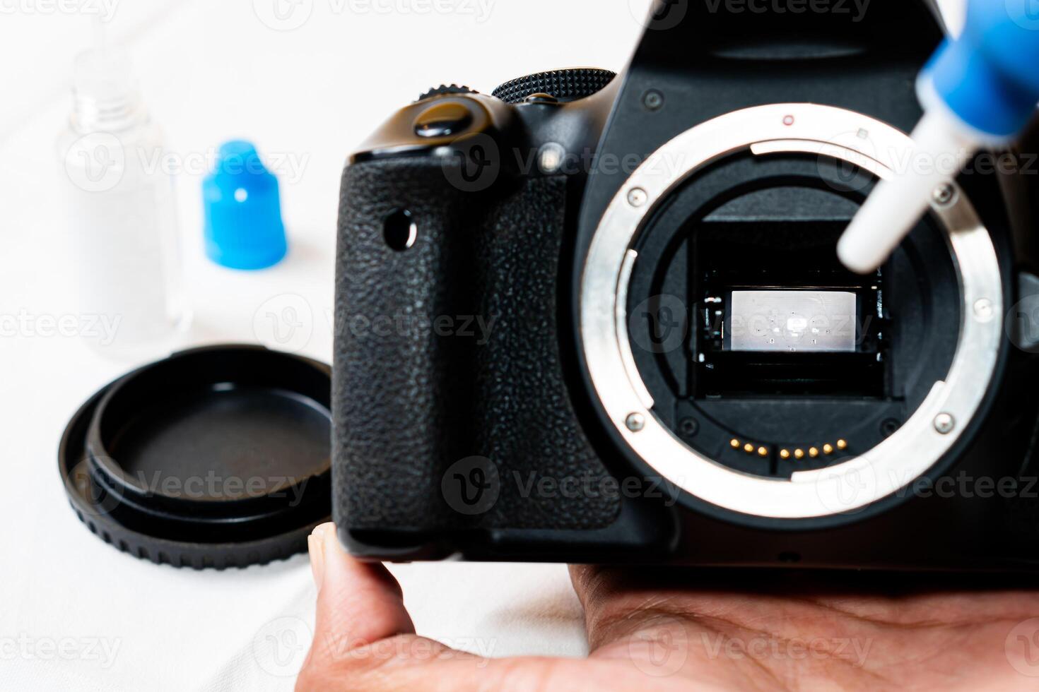 SLR Camera Sensor Cleaning with Swab photo