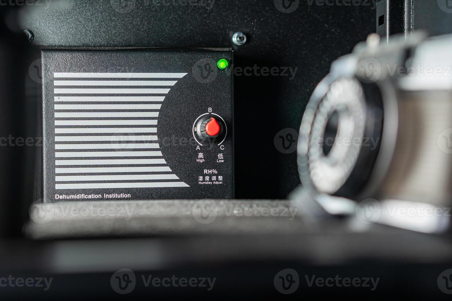 Dehumidifier Control Panel with Camera Lens photo