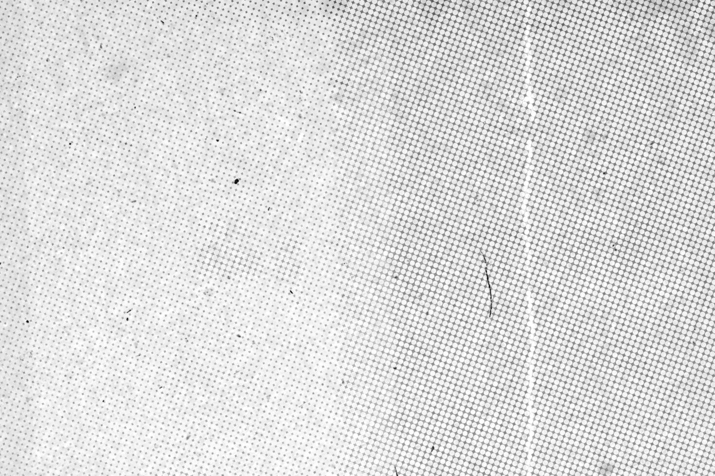 scanned paper, Halftone faded gradient texture. Grunge halftone grit background. White and black sand noise effect overlay photo