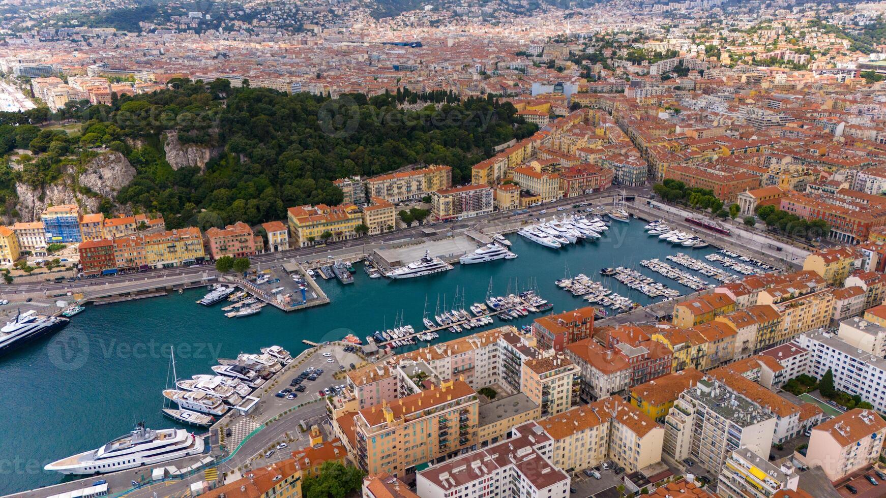 Aerial View of Nice Harbor with Yachts and Colorful Buildings on French Riviera photo
