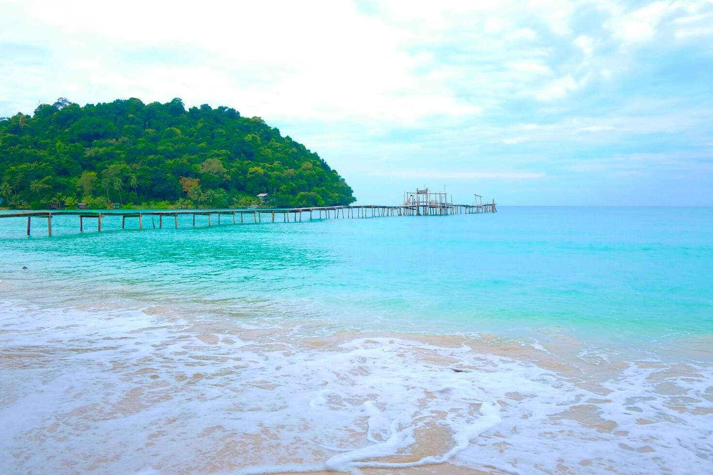 Beautiful sea on the tropical beach whit wooden bridge in Koh Kood Thailand photo