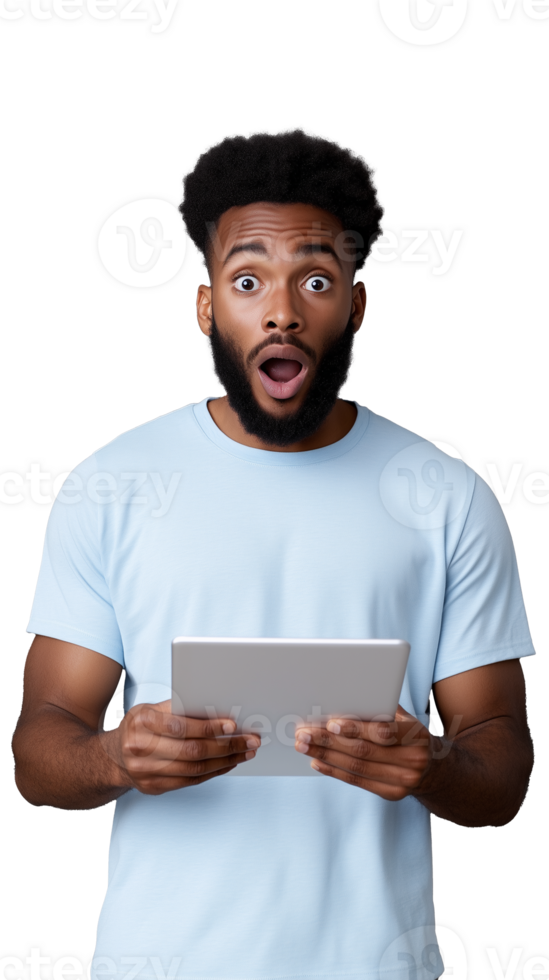 Surprised young man holding tablet on transparent background, shocked and expressive look png