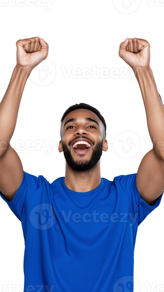 Excited young man in blue shirt raising arms in celebration on transparent background png