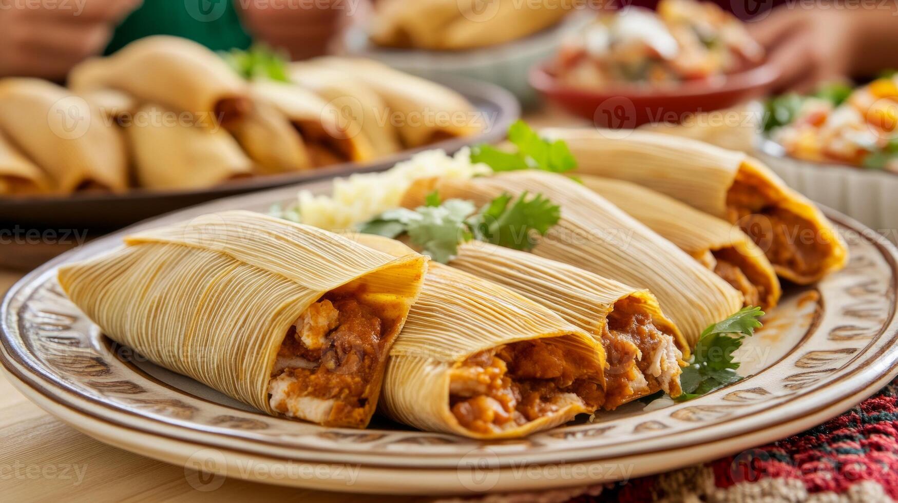 Family members savoring delicious homemade tamales at a joyful gathering around the dining table photo