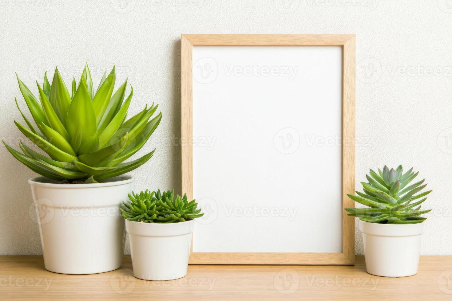 Minimalist poster frame with small plants on a wooden floor in soft ambient light photo