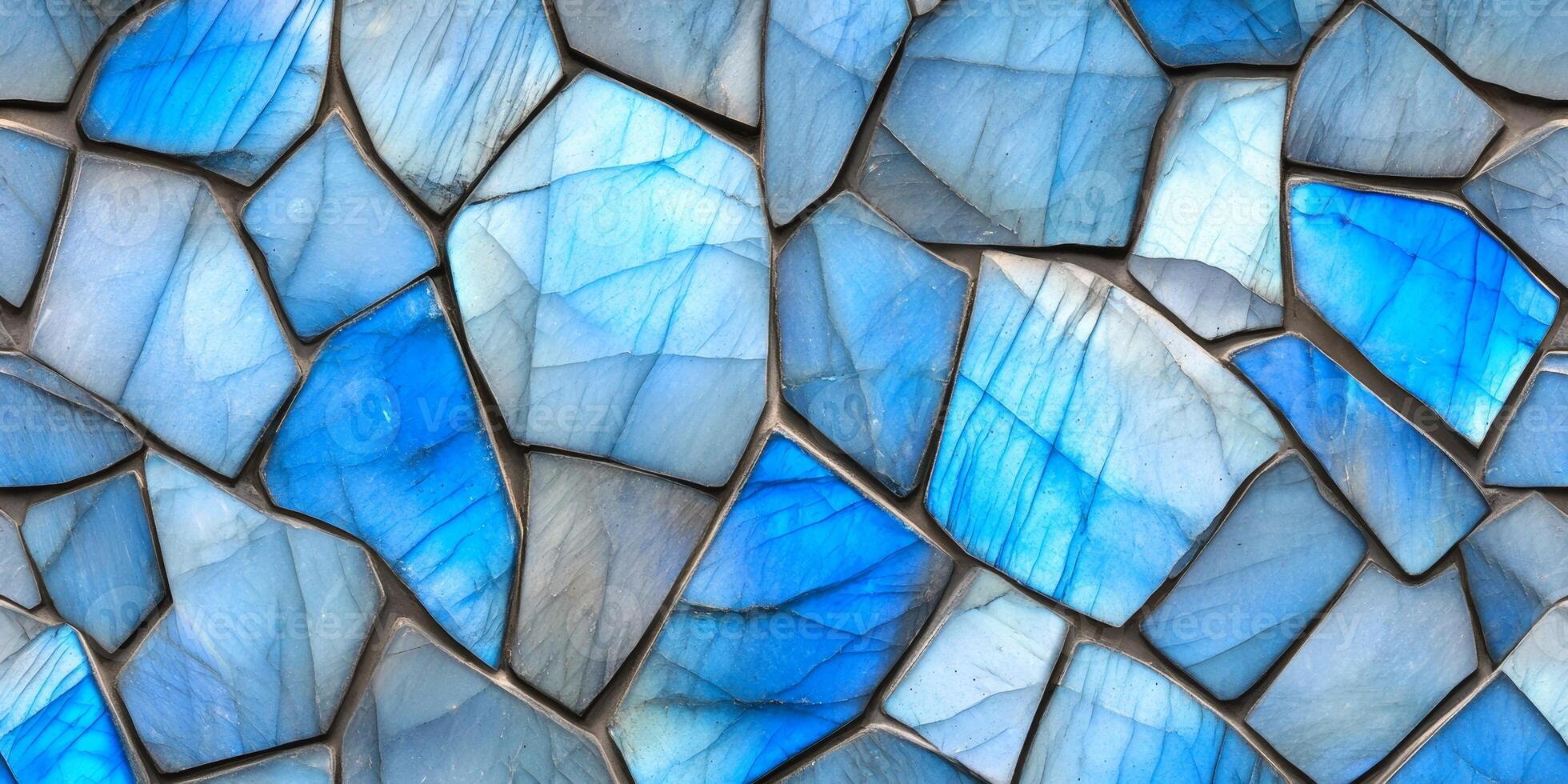 Polished blue labradorite with oceanic hues reflecting light and showcasing natural crystal patterns photo