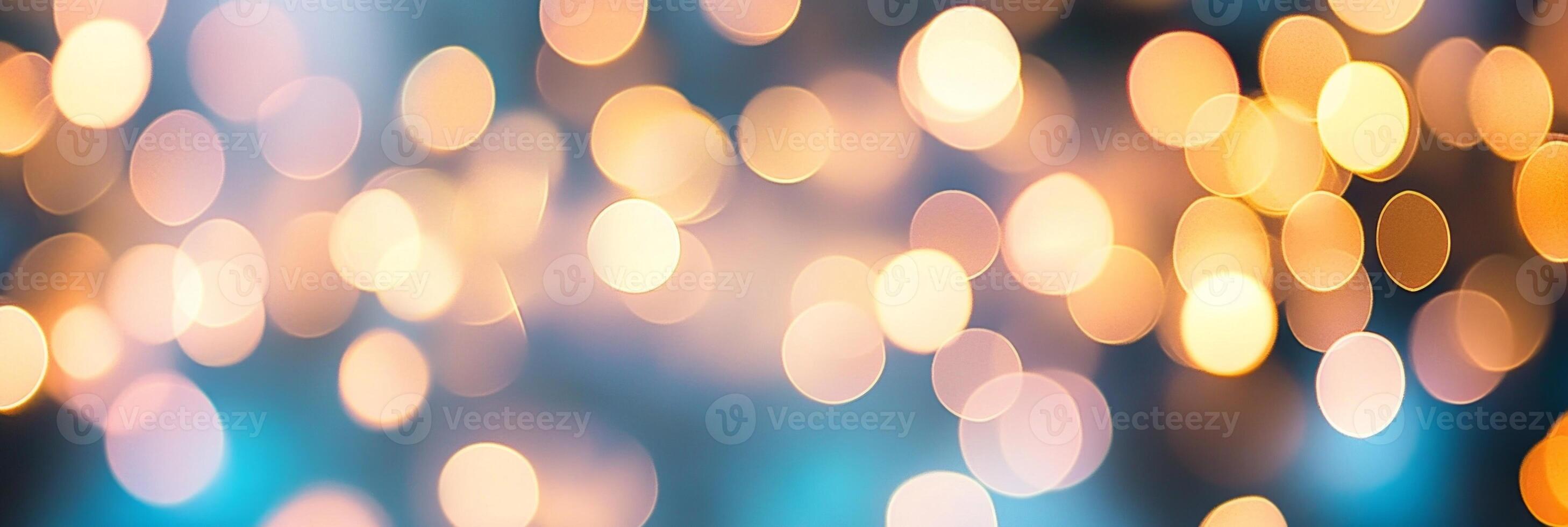 Beautiful abstract bokeh of warm orange and gold sparks shimmering against a dark blurred background photo