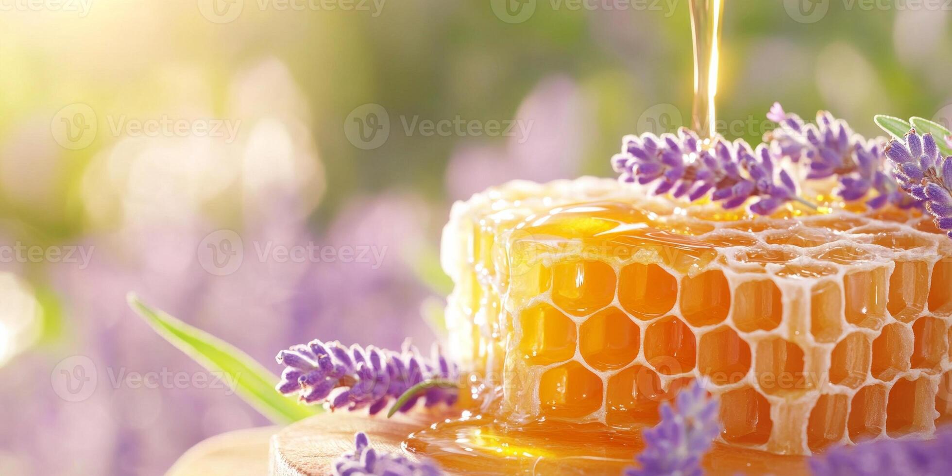 Honeycomb drizzled with golden honey and surrounded by fresh lavender in a serene outdoor setting photo