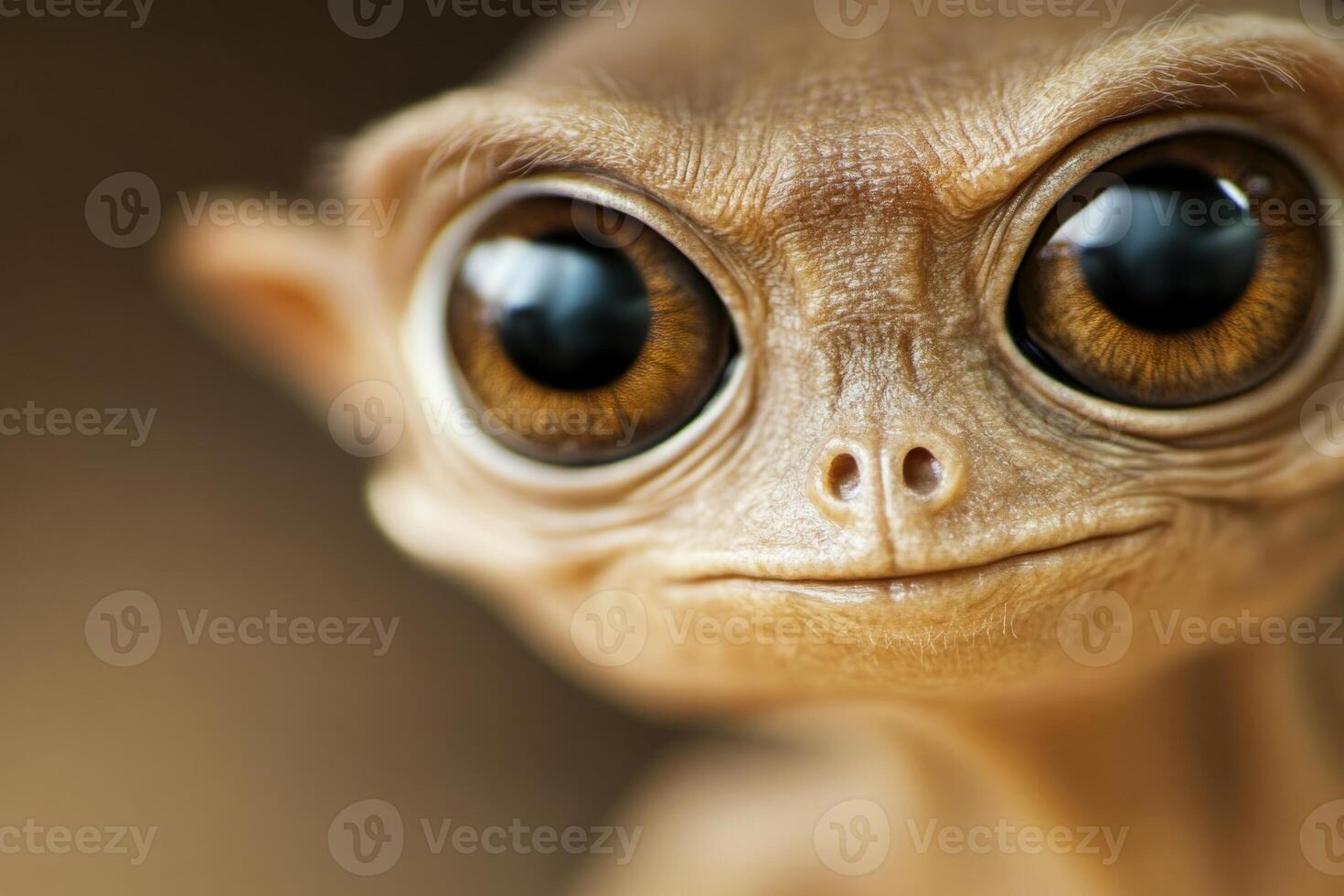 A close-up of an alien character, showcasing a serious expression and intricate facial details photo