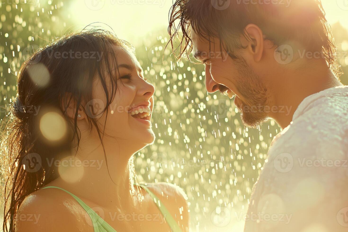 Joyful Hispanic couple dancing in the rain during a sunny afternoon, capturing playful moments of laughter photo