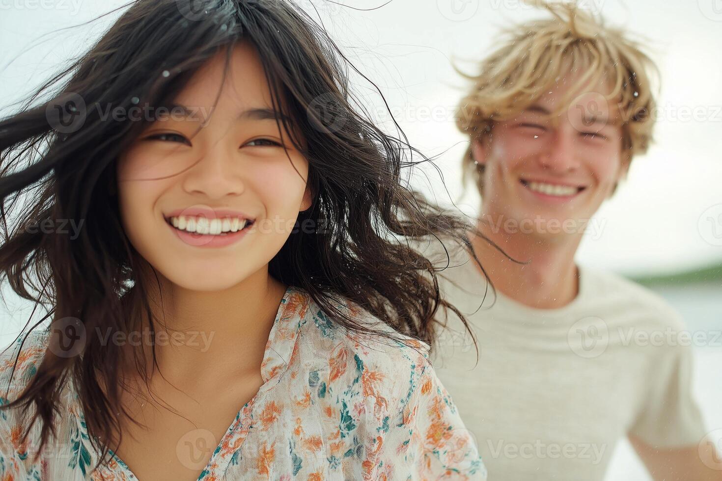 Young couple dancing in gentle rain in bright morning light, embracing joy and love in a minimalistic setting photo