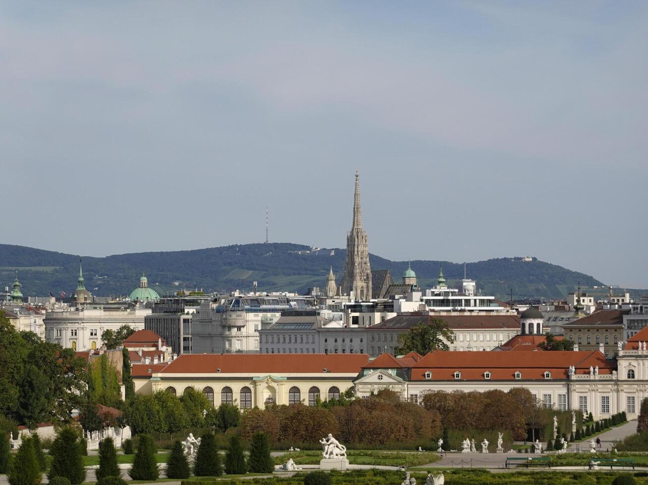 Vienna, Austria - 11 September 2024 View of the gardens from the Upper Belvedere with the roof of St. Stephen's Cathedral Stephansdom in the distance, Vienna. photo