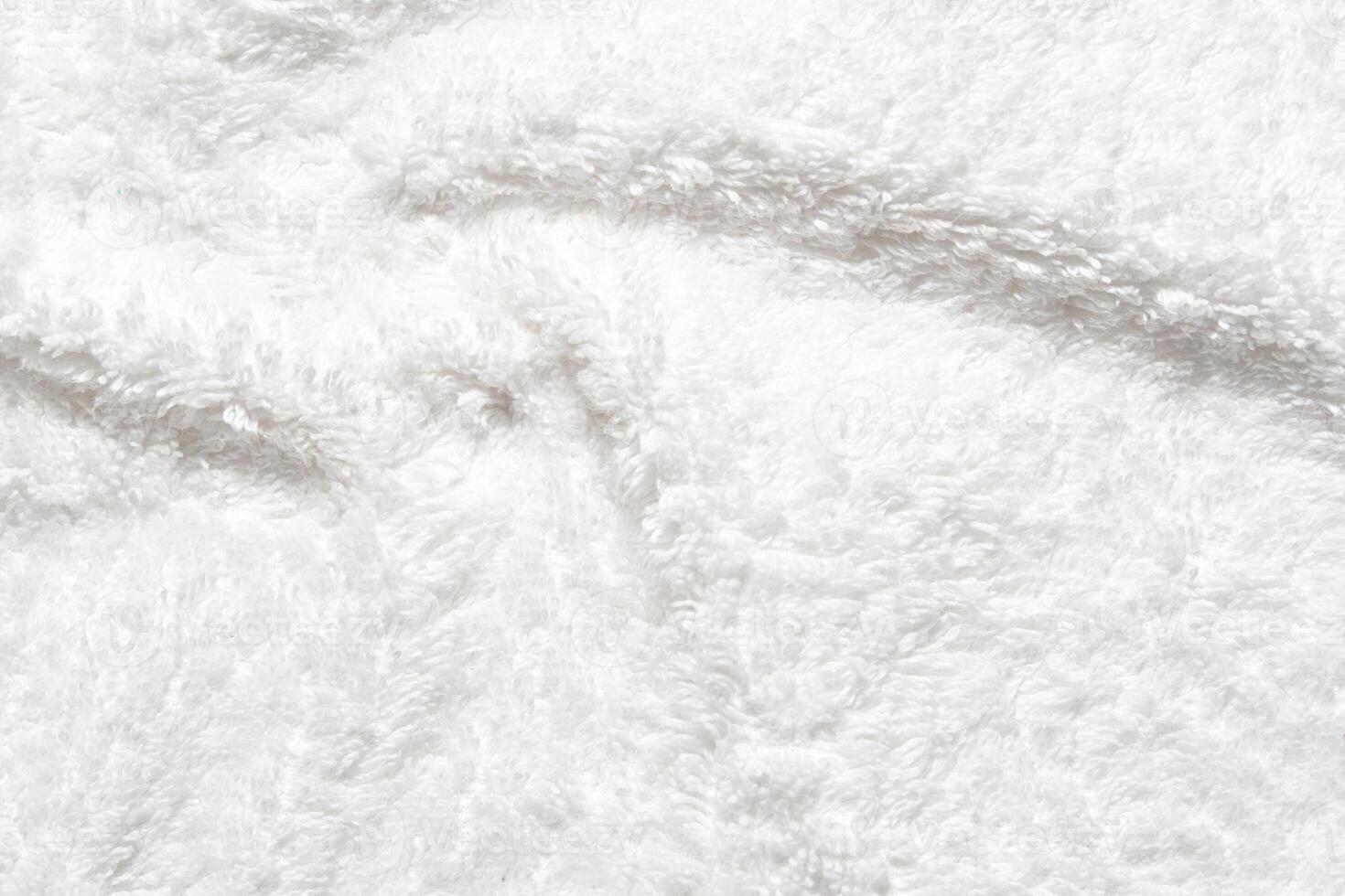 Soft white fleece texture with fluffy surface for cozy and comfortable backgrounds. photo