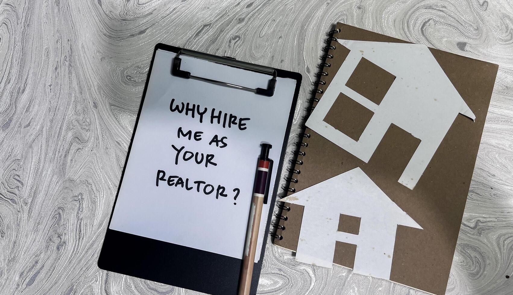 Concept of Why Hire Me As Your Realtor write on paperwork isolated on wooden background. photo