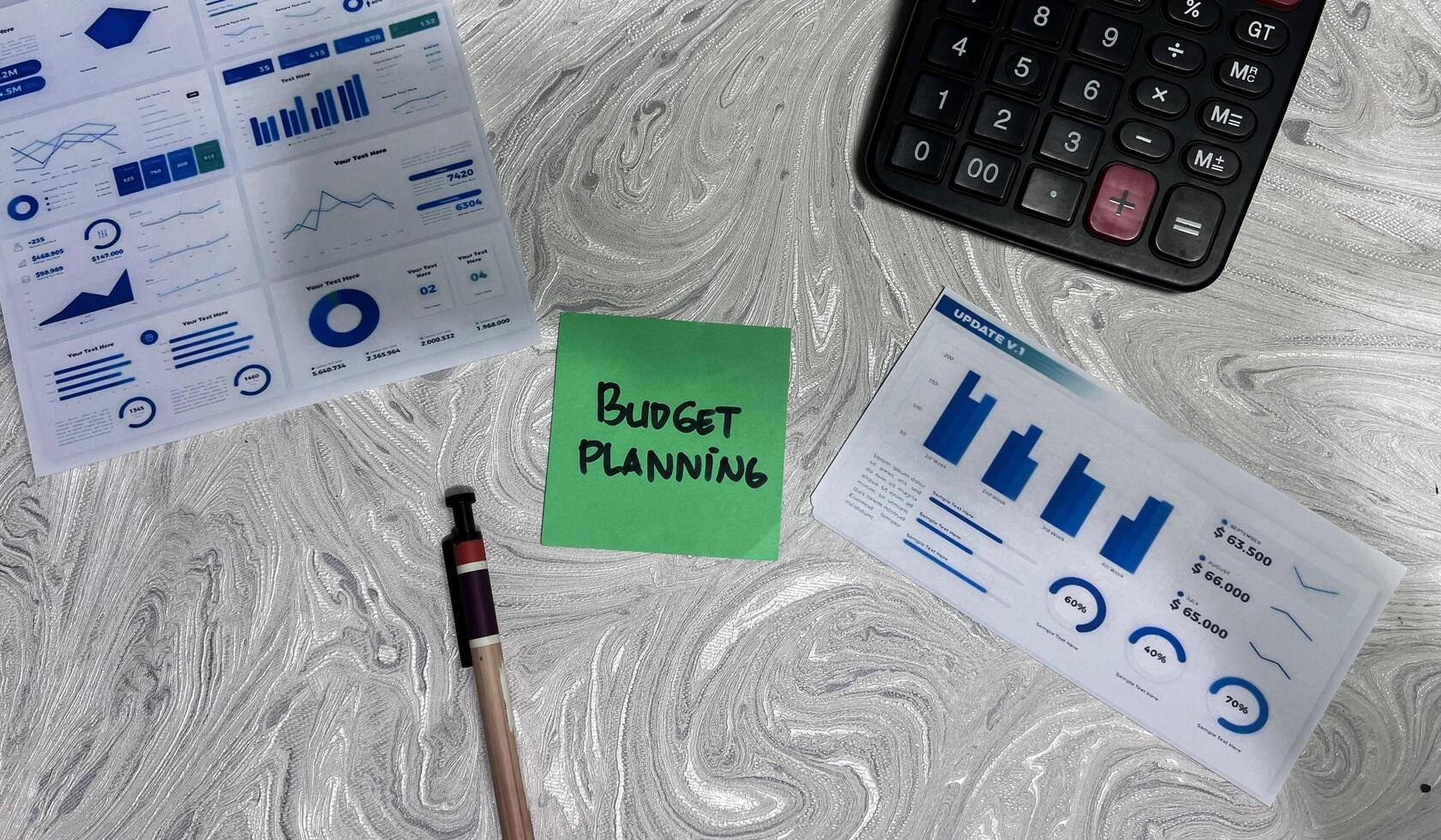 Concept of Budget Planning write on sticky notes isolated on Wooden Table. photo