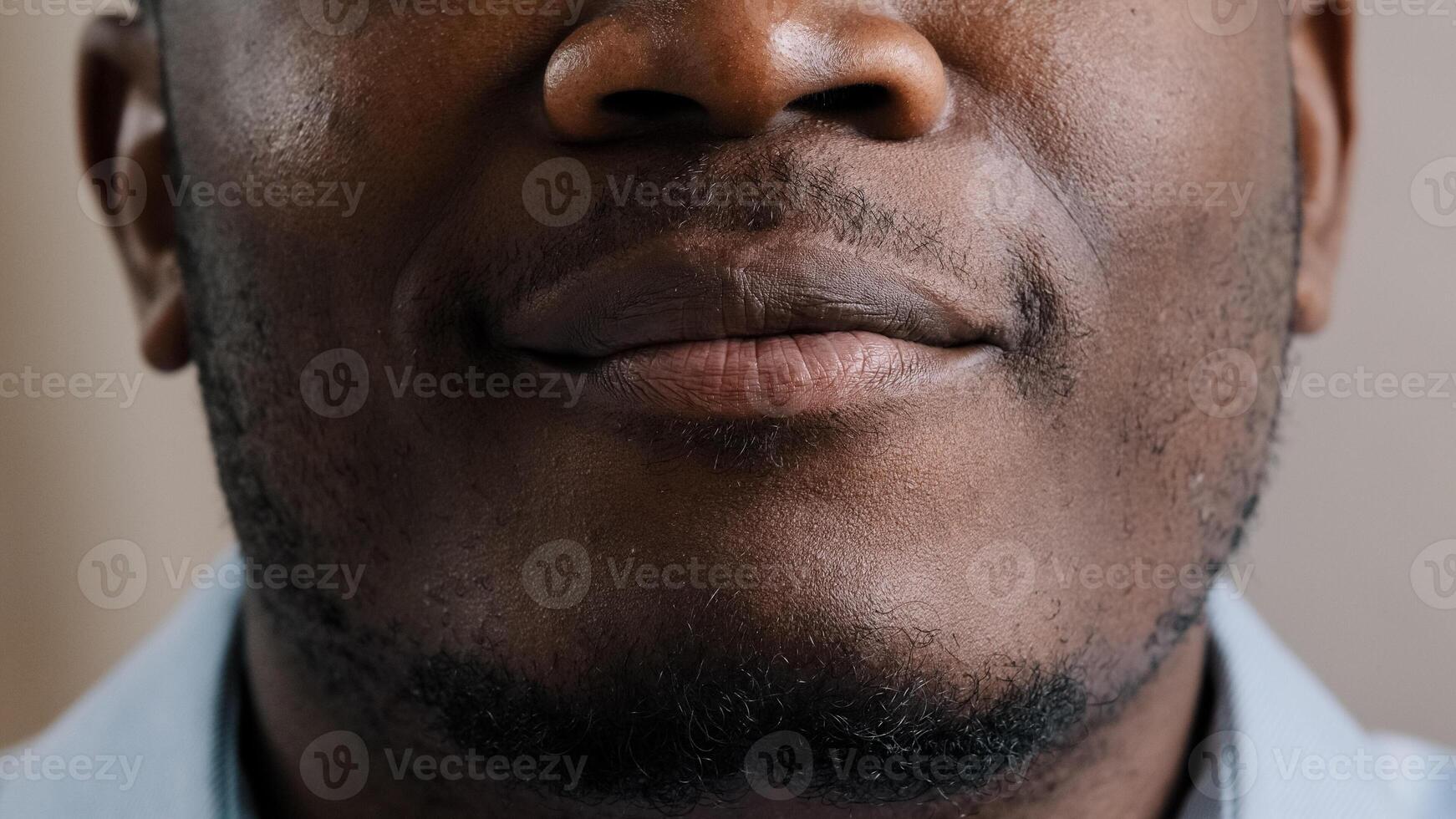 Extreme close up happy male smiling face african american young man positive male model ethnic guy smile toothy with white healthy teeth advertisement after stomatological treatment dental procedure photo