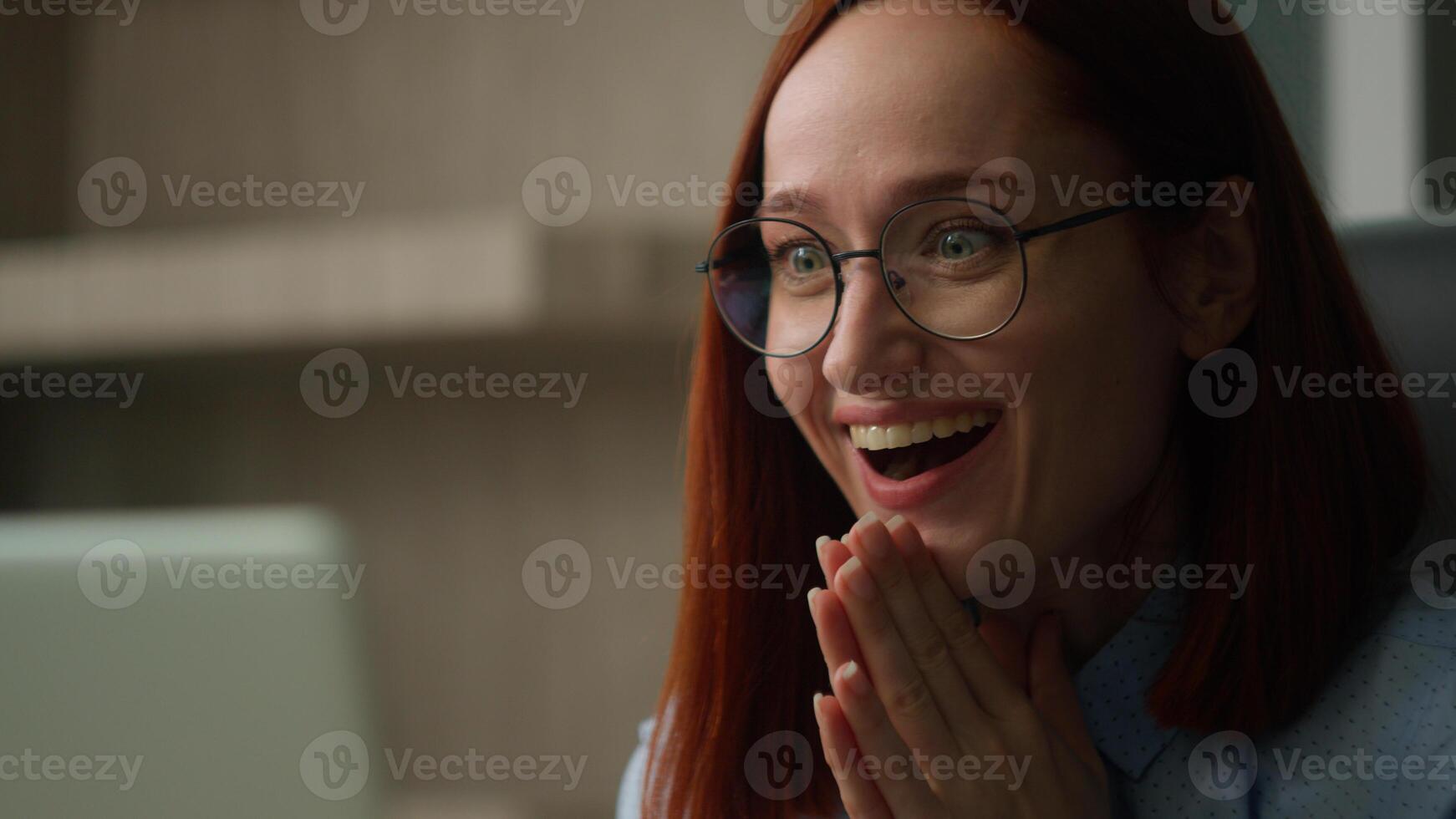 Close up amazed shocked Caucasian business woman surprised with unexpected unbelievable good news looking at computer screen excited happy girl businesswoman in office winning achieve laptop wonder photo