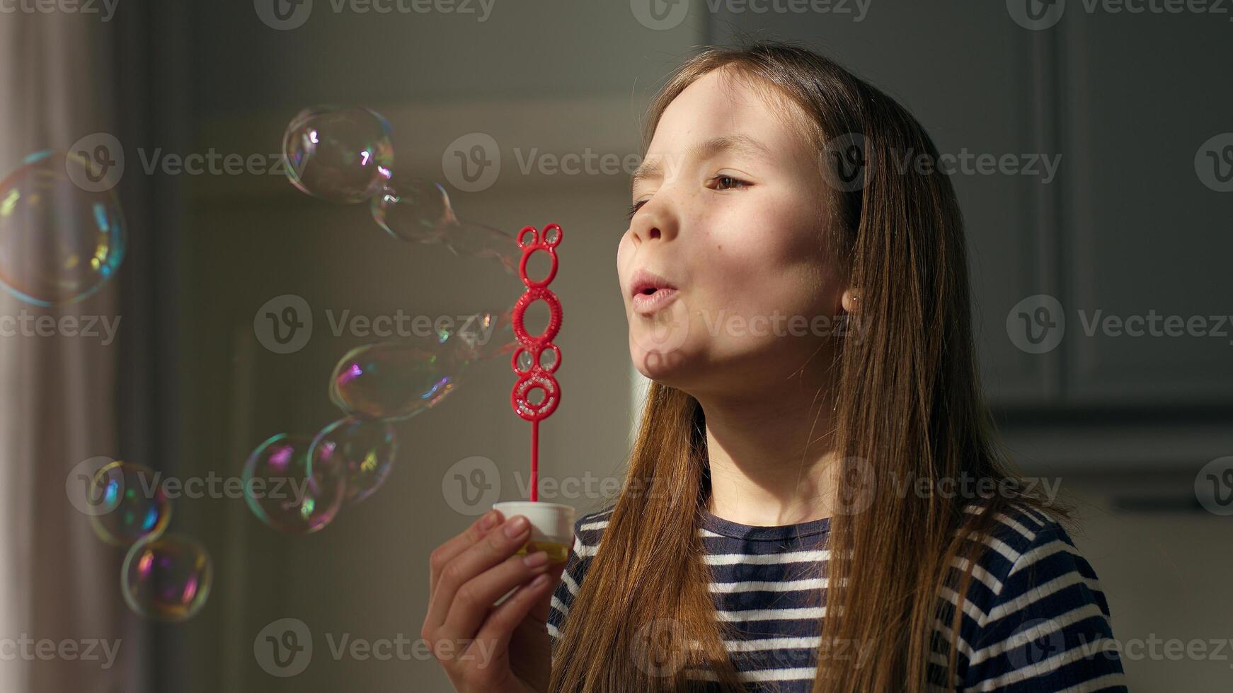 Caucasian European little girl blowing soap bubbles daughter child childhood fun enjoyment smile happy female play time kid baby bubble joyful vacations toy dream foam game magic imagination innocence photo