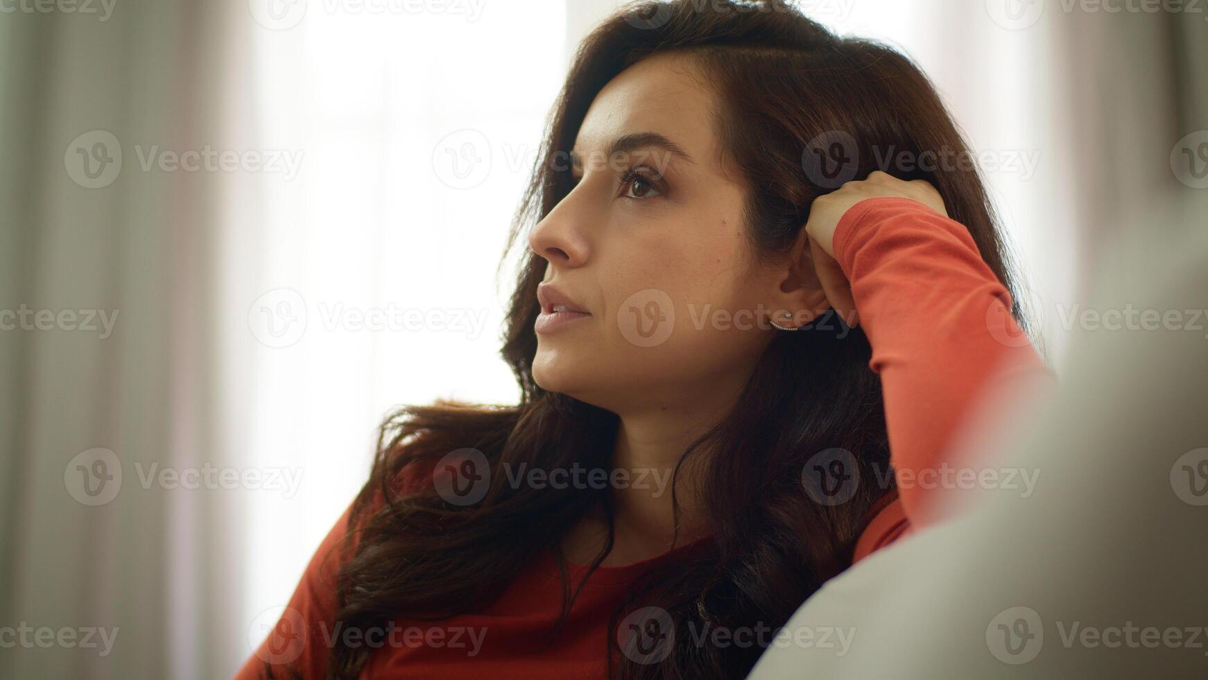 Bored sad Caucasian upset woman lazy female girl unhappy client user scrolling mobile phone smartphone browsing social media online app on couch burnout problems boredom depression indoors home room photo