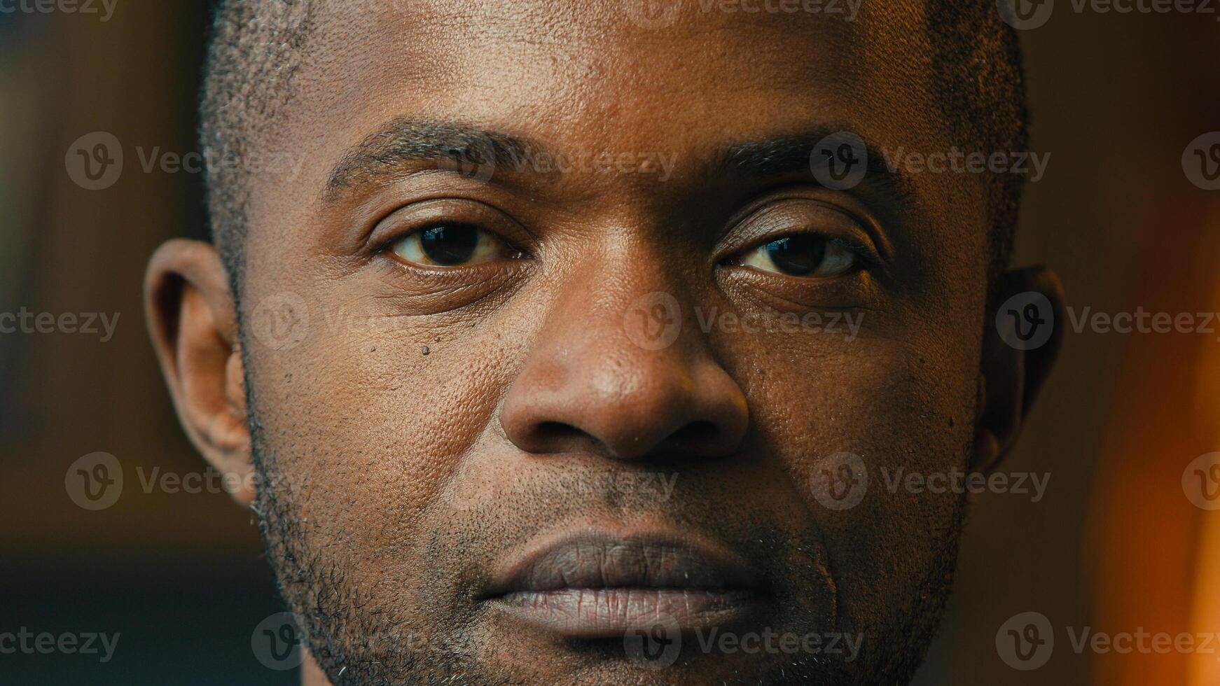 Close-up male portrait serious sad lonely mature african american man looking at camera desperate unhappy hopeless middle-aged ethnic businessman posing indoors crisis problem concept moving footage photo