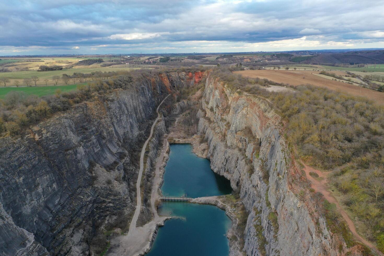 An aerial view of a canyon with a river in it photo