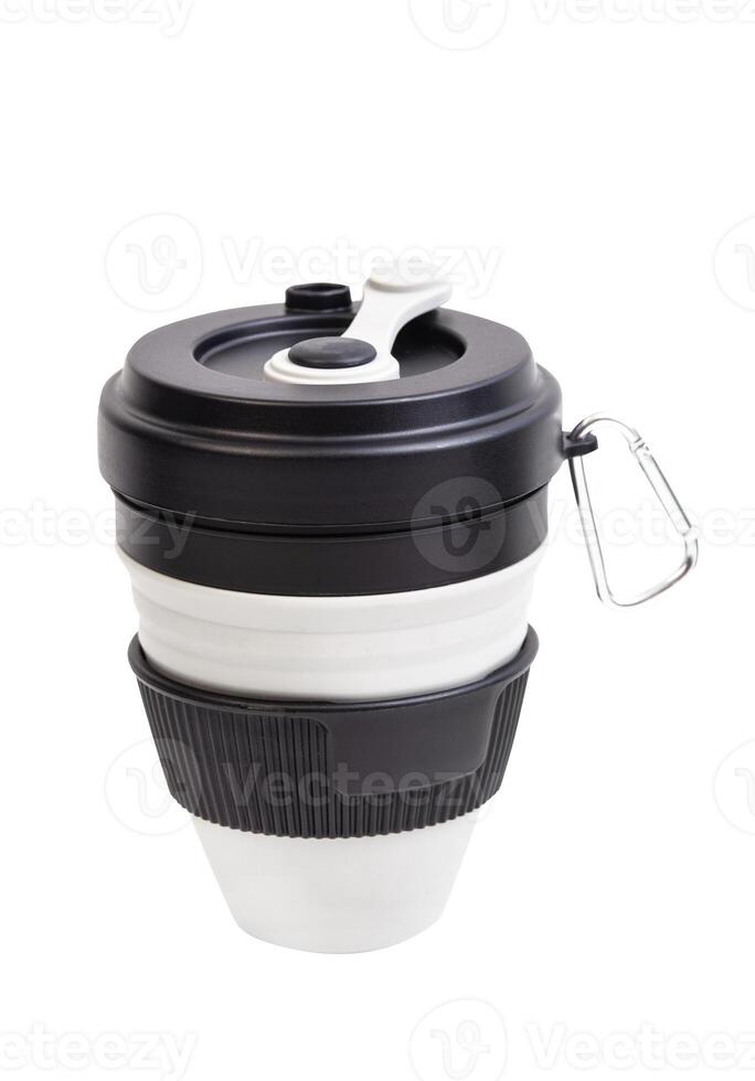 reusable silicone cup with holding. folding cup isolated on white background. replacement of plastic cup photo