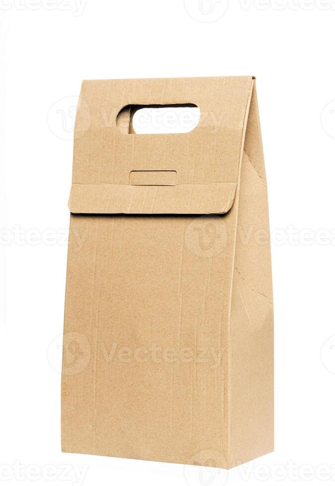 Paper food box packaging mockups brown color. Blank craft folding bag mockup, side view. Carton bottle package with handle for carrier mockup isolated. Clear disposable paperboard holder photo