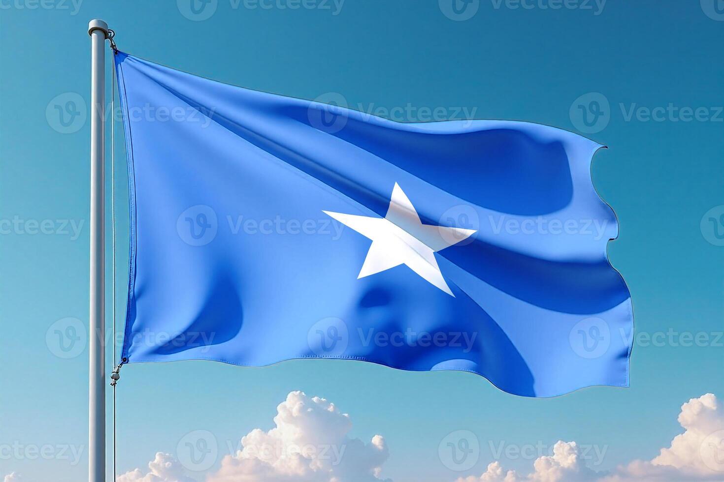 Somalia Flag Waving Against Clear Blue Sky photo
